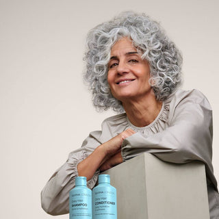 Founder Silvina NEDER showing bottles